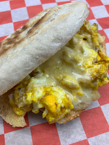 Cafe, Egg and Cheddar on a Wild Flour Focaccia, Saturday Breakfast only